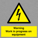 warning-work-in-progress-on-equipmentwith-electrical-hazard-symbol~